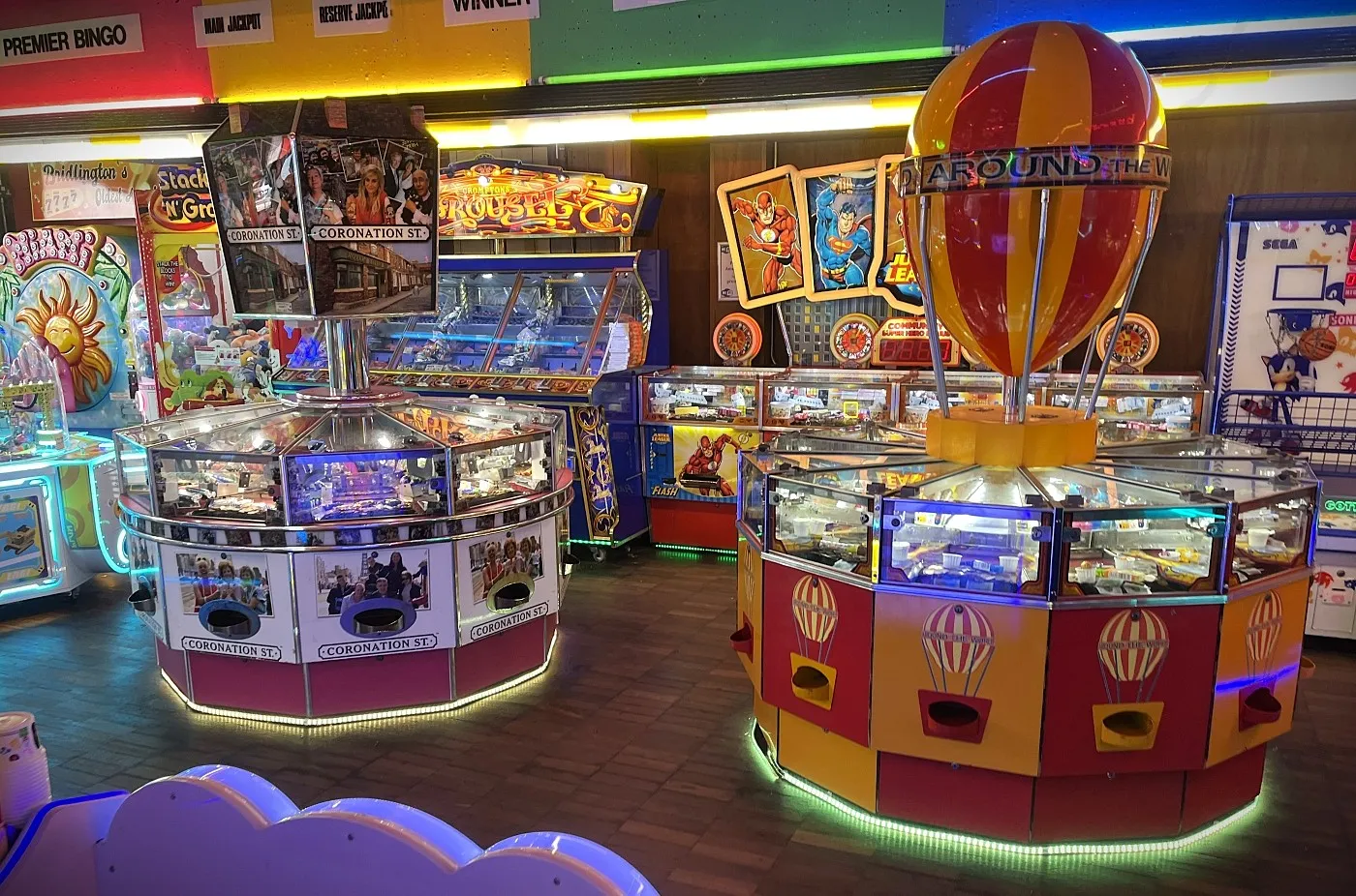 around the world coin pusher