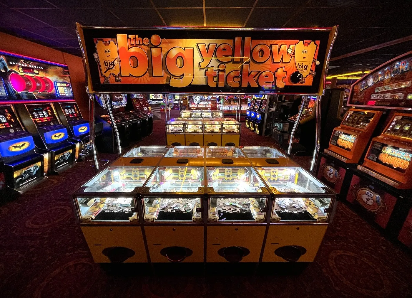 the big yellow ticket coin pusher