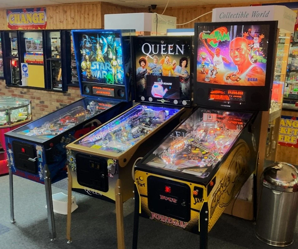row of classic pinball machines