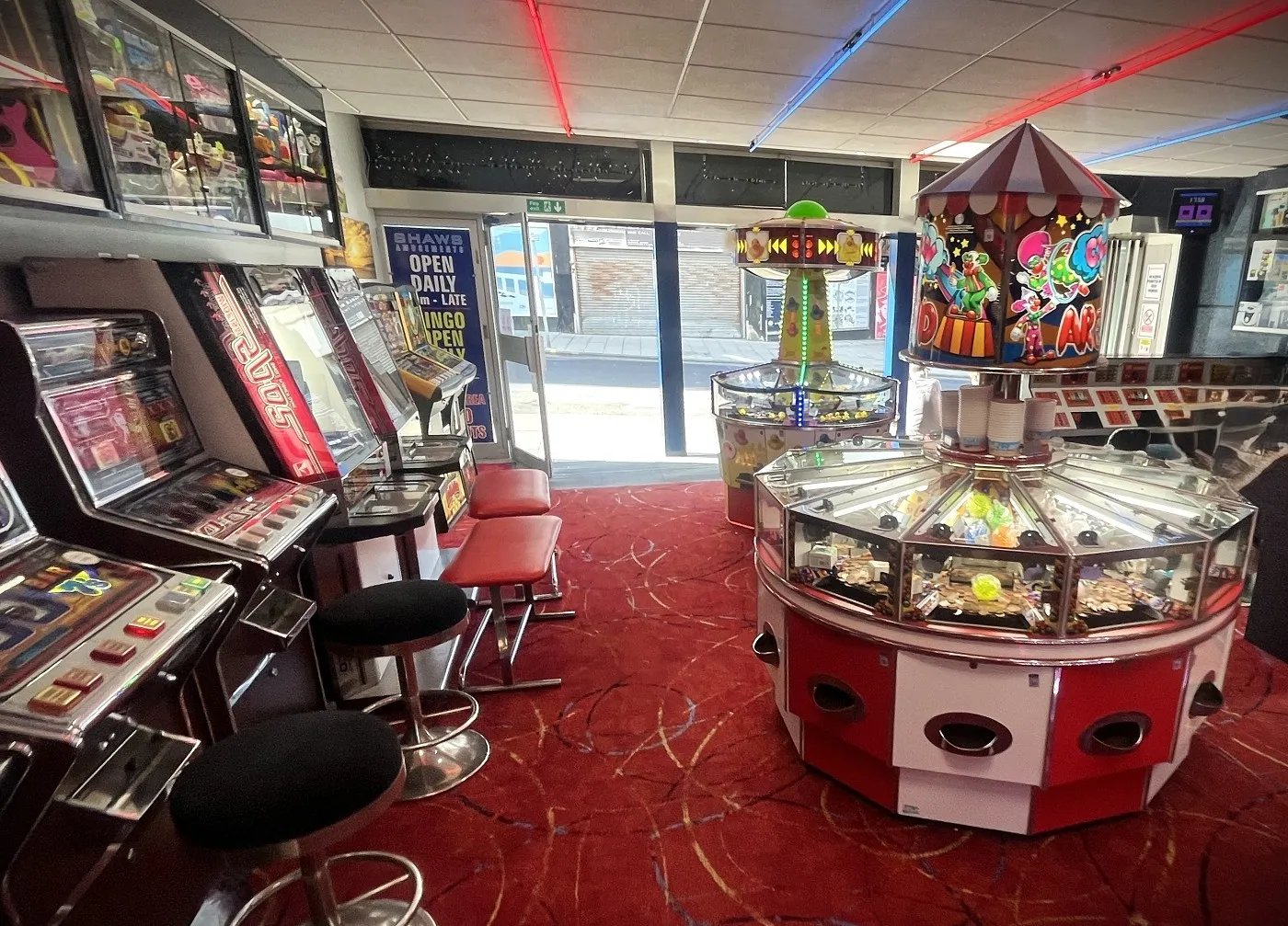 clown around coin pusher and pac man ball machines