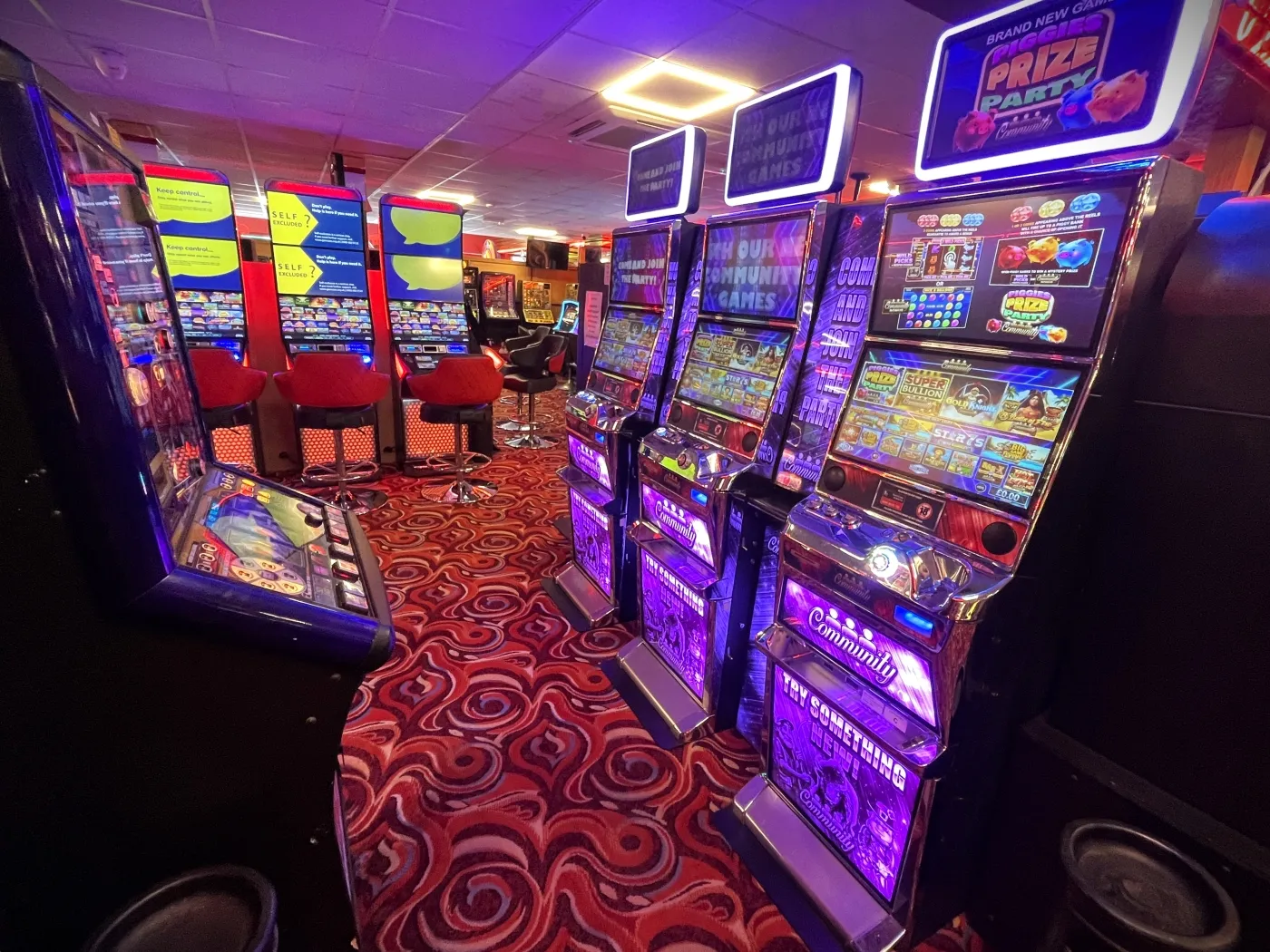 a row of community slot machines