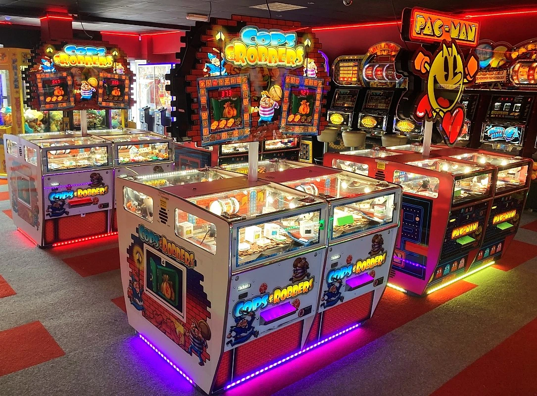 cops and robbers coin pusher game