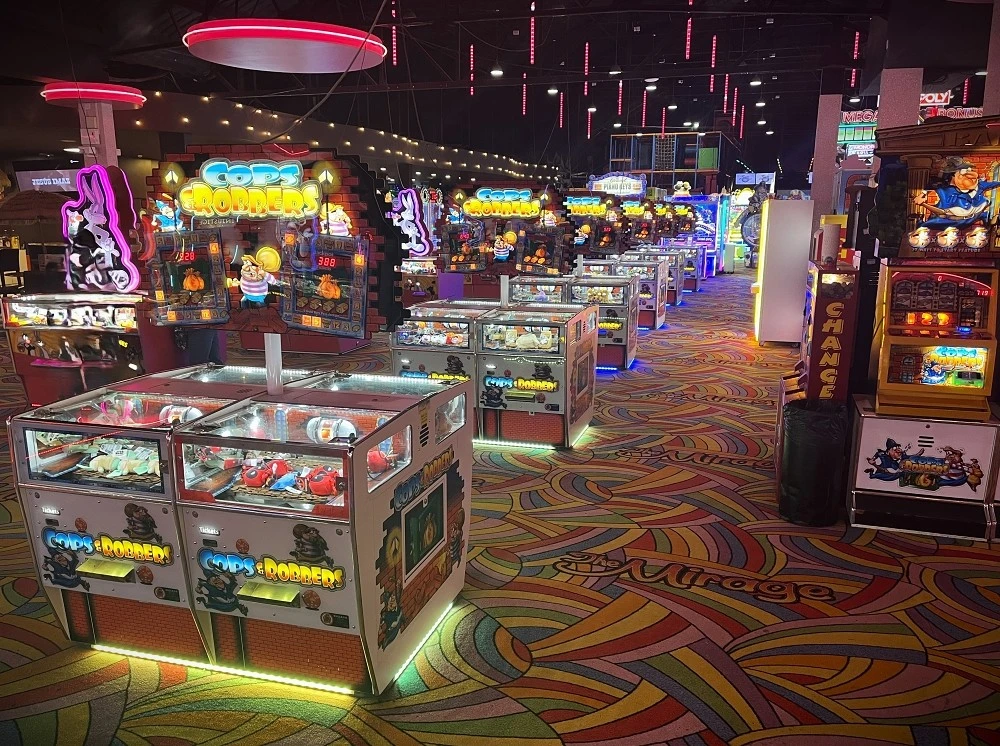 row of cops and robbers coin pushers