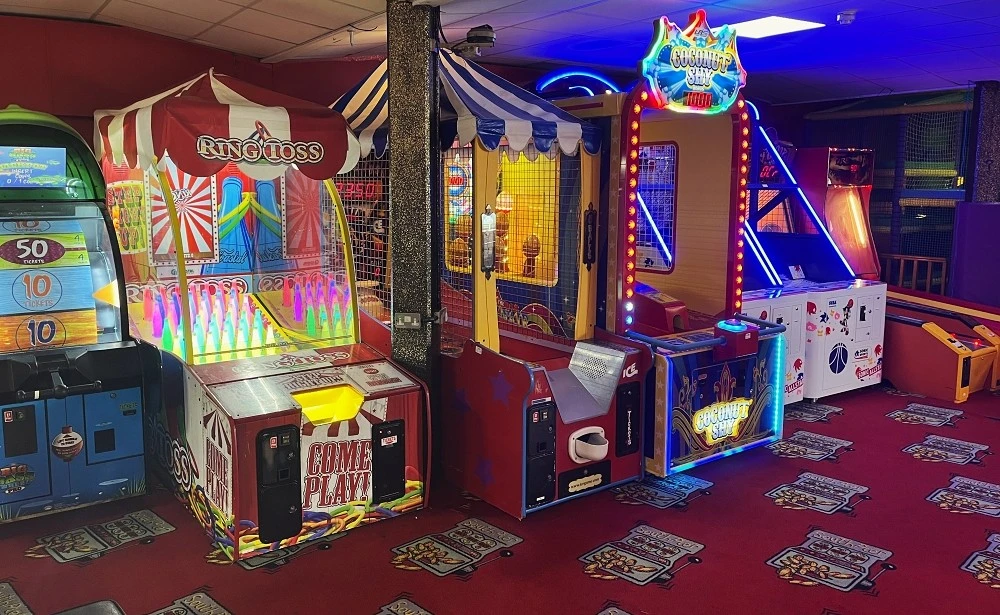row of fairground arcade machines