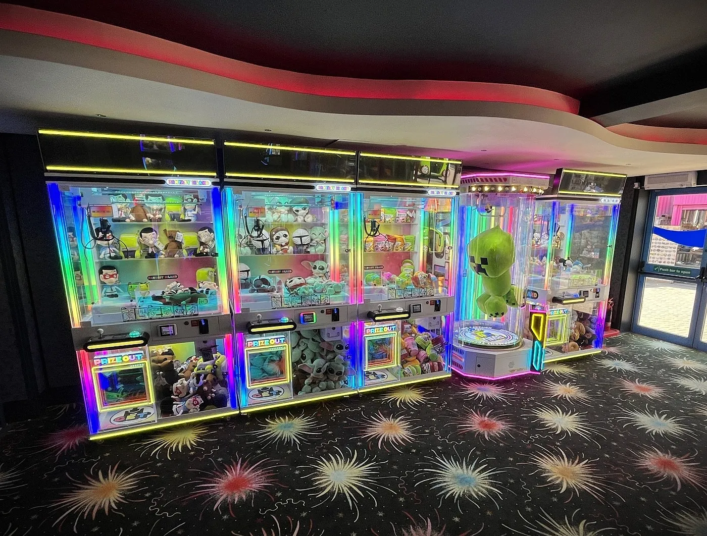row of fantasy island claw machines