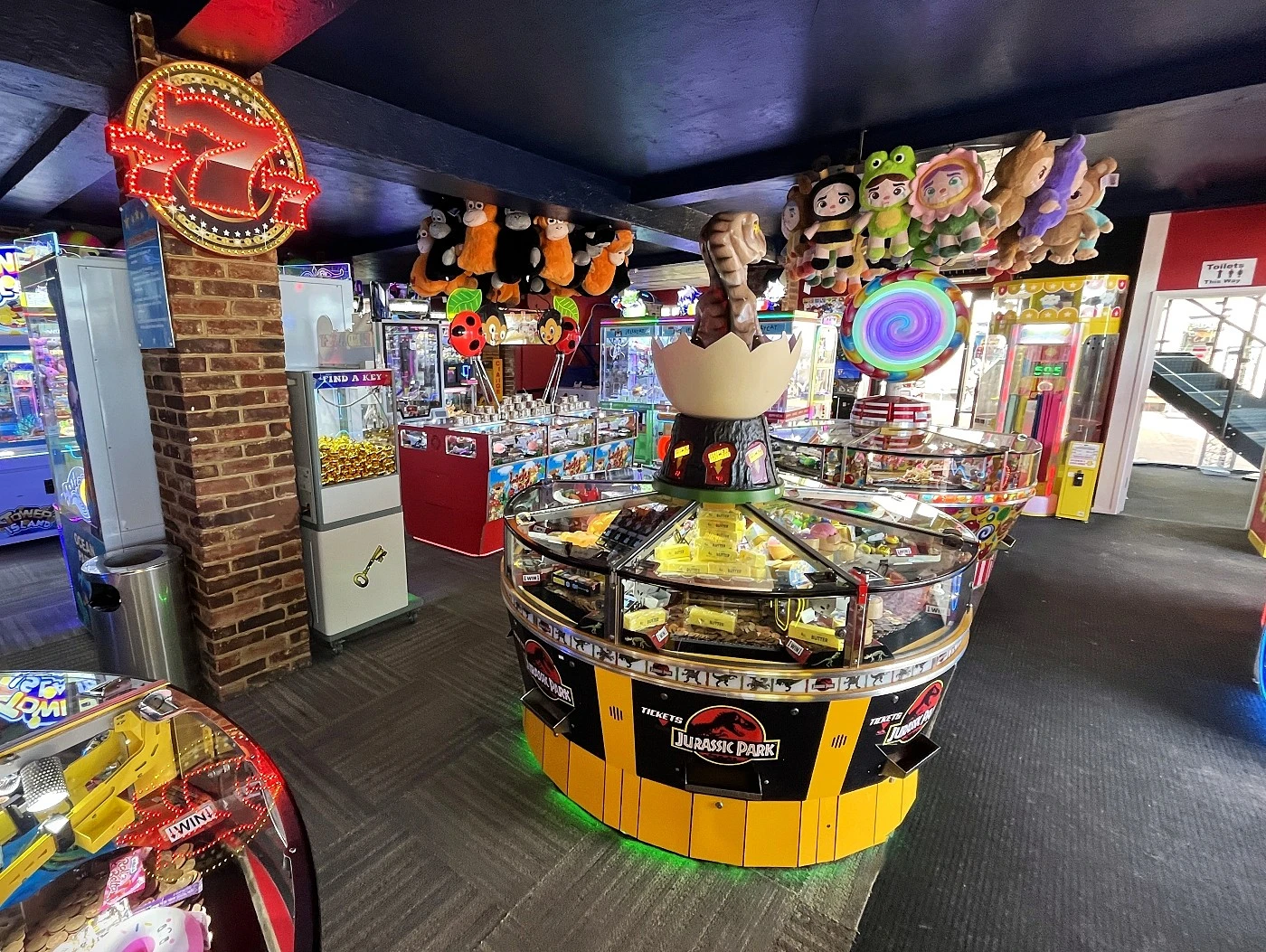 jurassic park ticket coin pusher