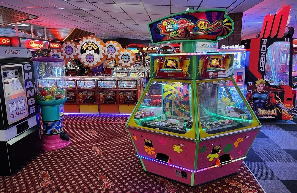 love machine coin pusher