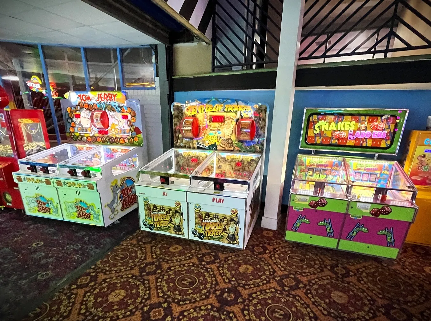row of arcade roll down 2p machines