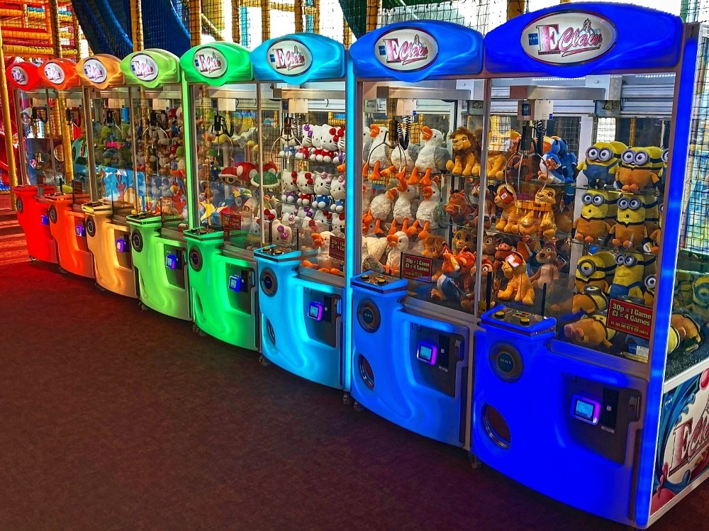 row of arcade claw machines