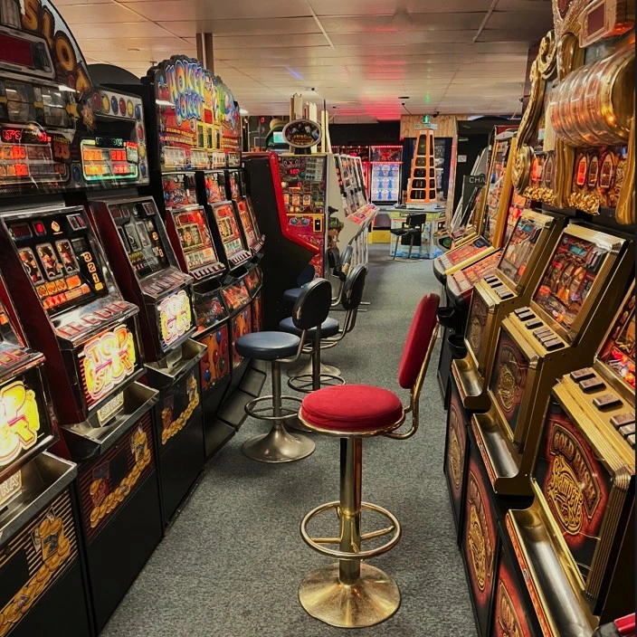 rows of triple fruit machines