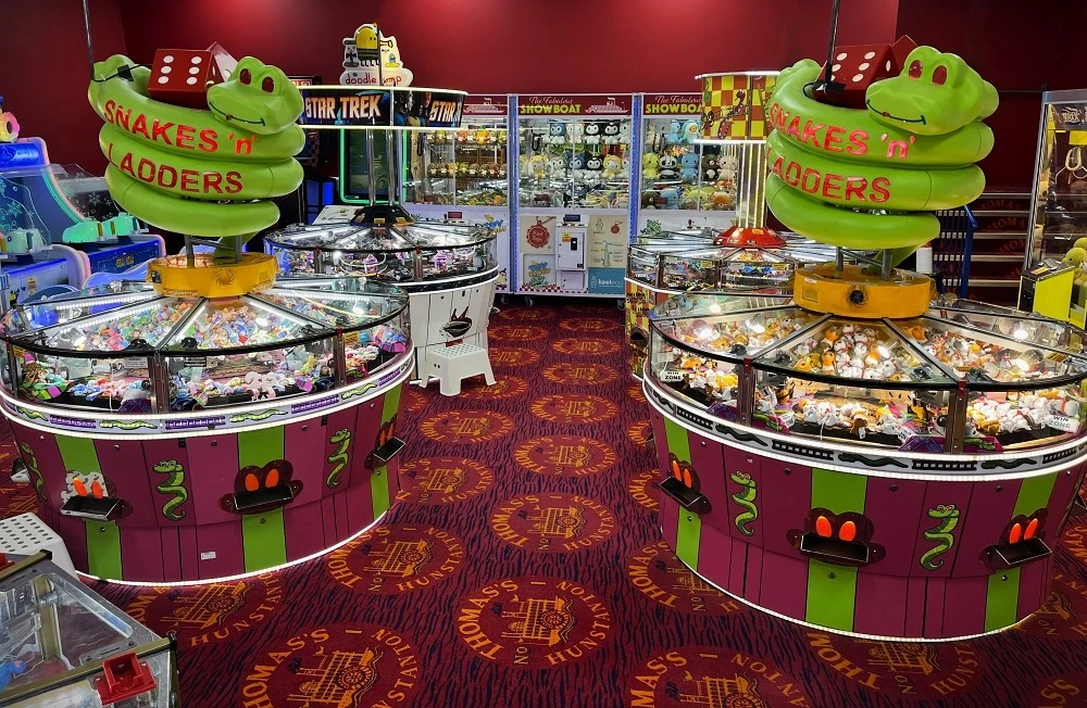 snakes and ladders coin pushers