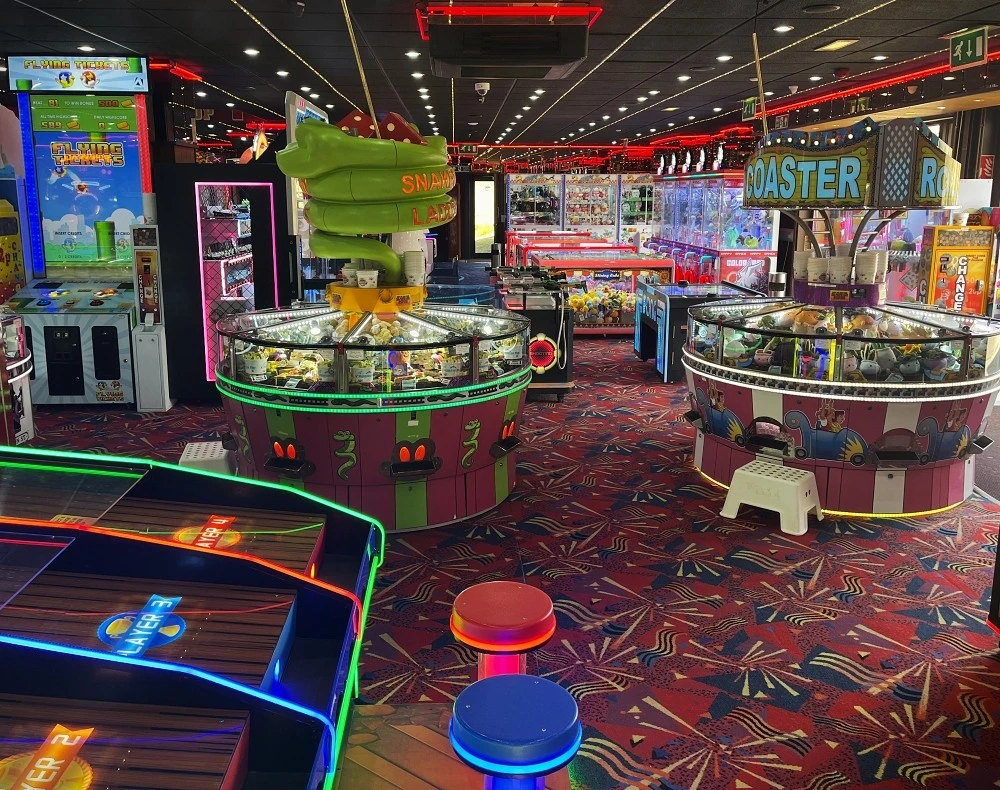 snakes and ladders coin pusher