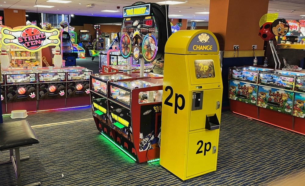 space invaders coin pusher arcade game