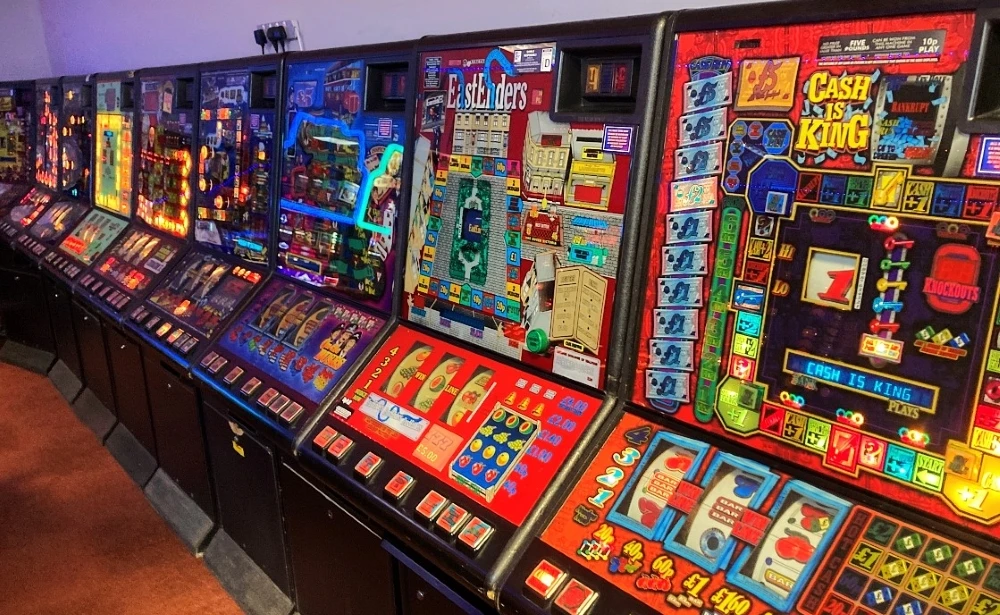 row of vintage maygay fruit machines