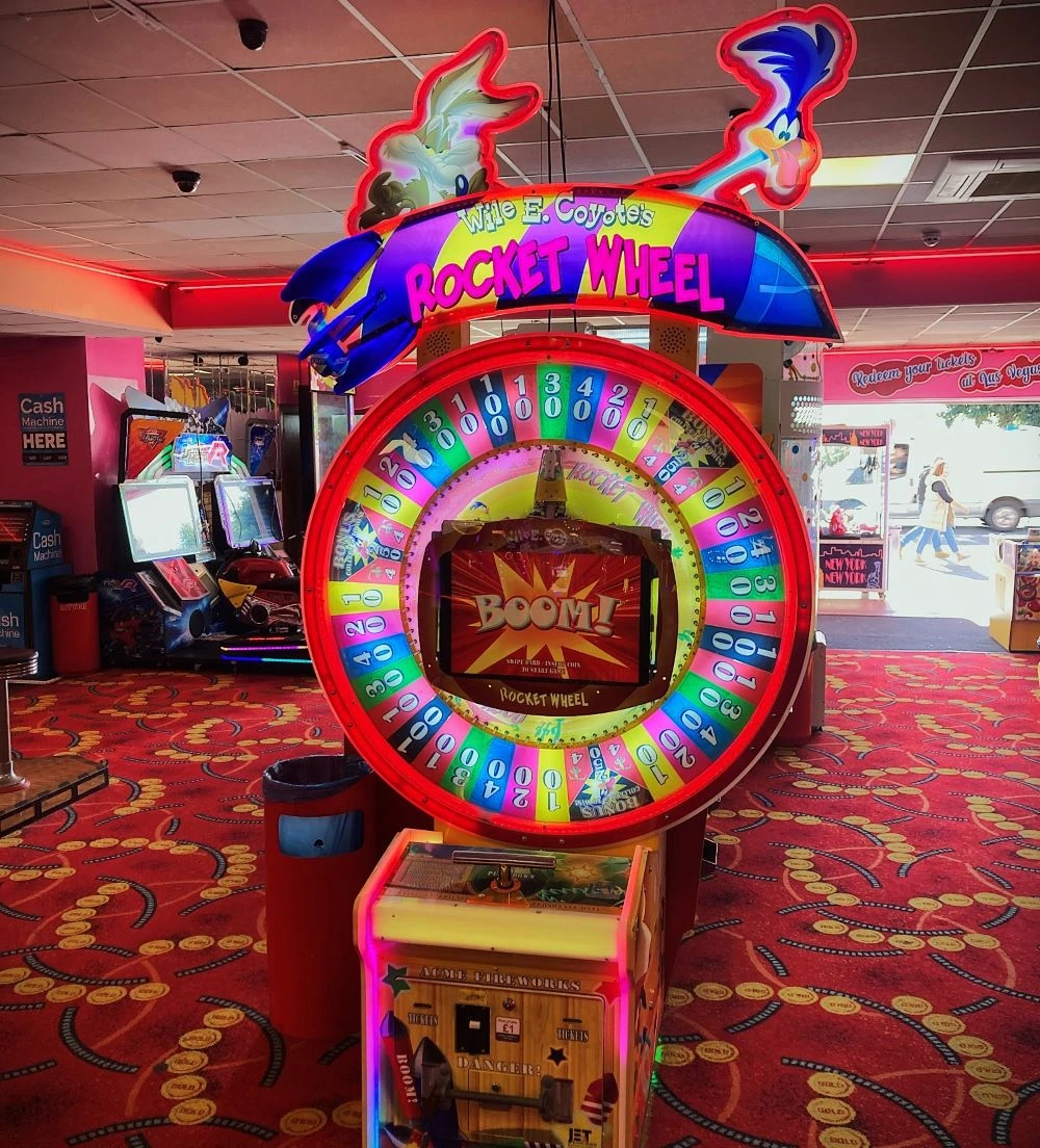wile e coyotes rocket wheel ticket arcade game