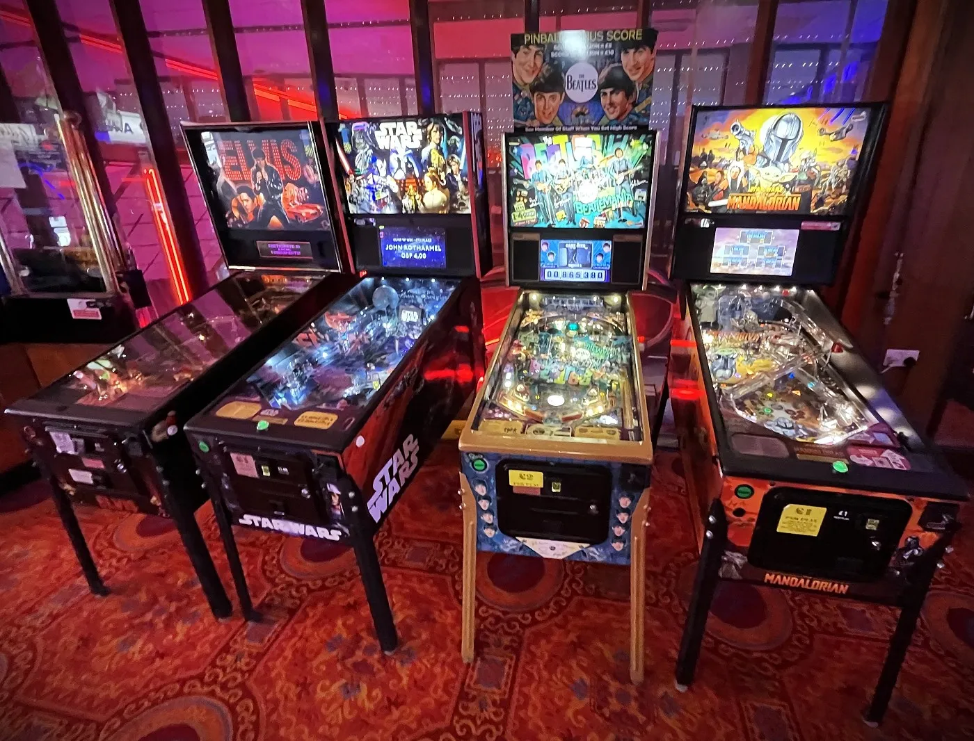 row of arcade pinball tables