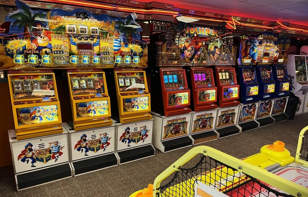 row of ticket fruit machines