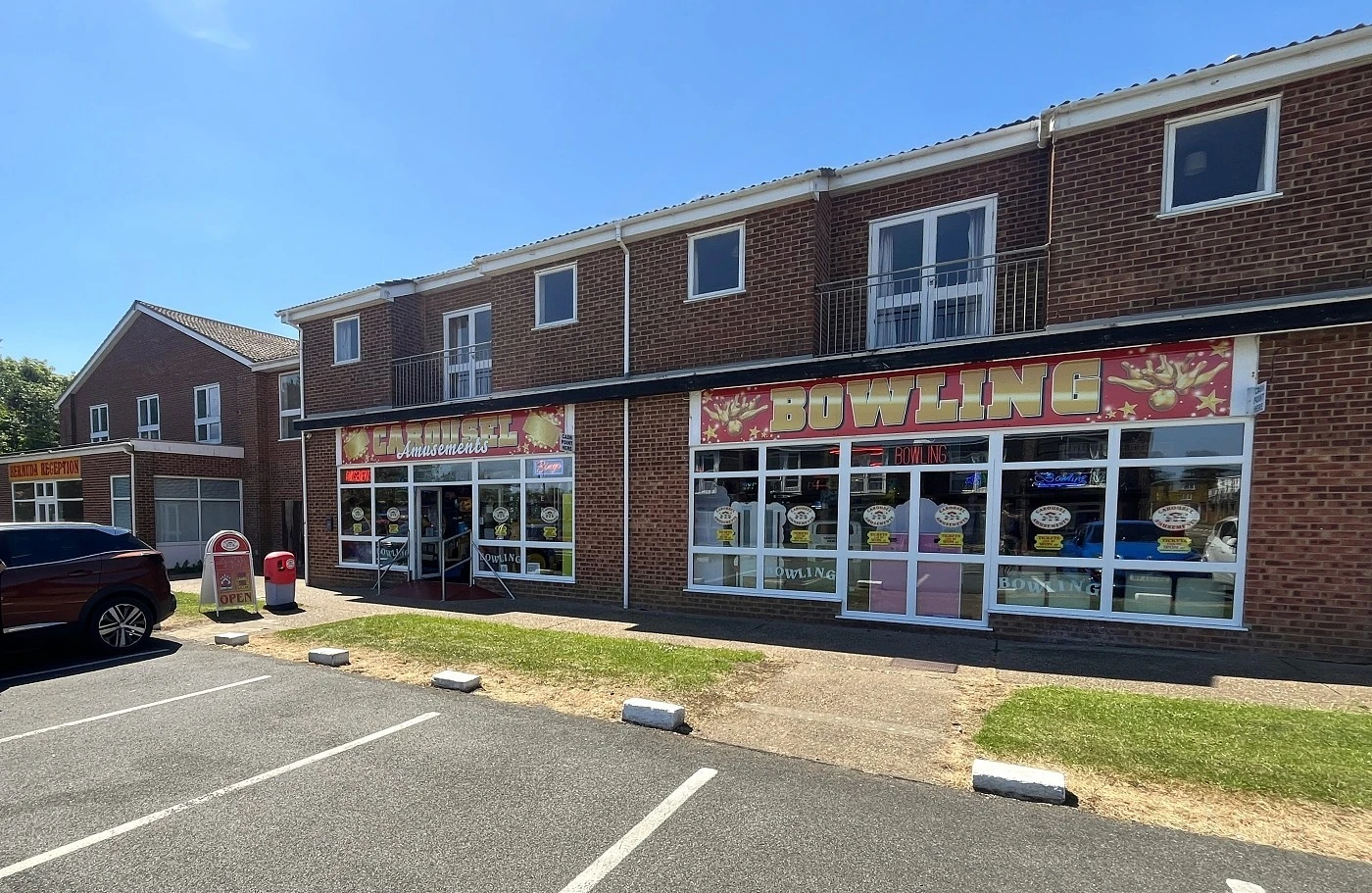carousel arcade entrance at bermuda holiday park