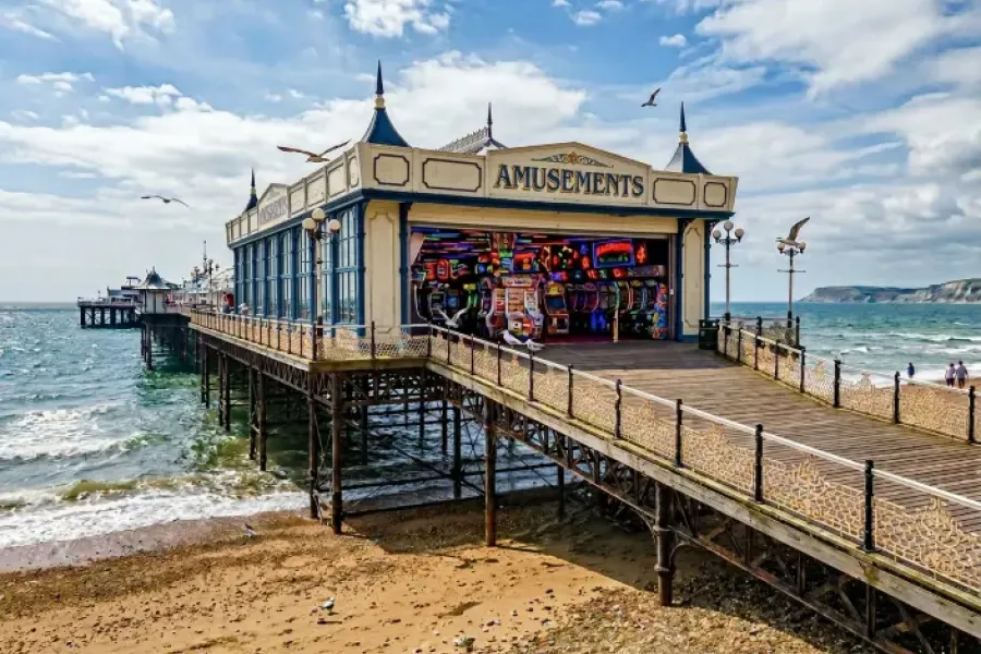 a British pier with an arcade at the entrance