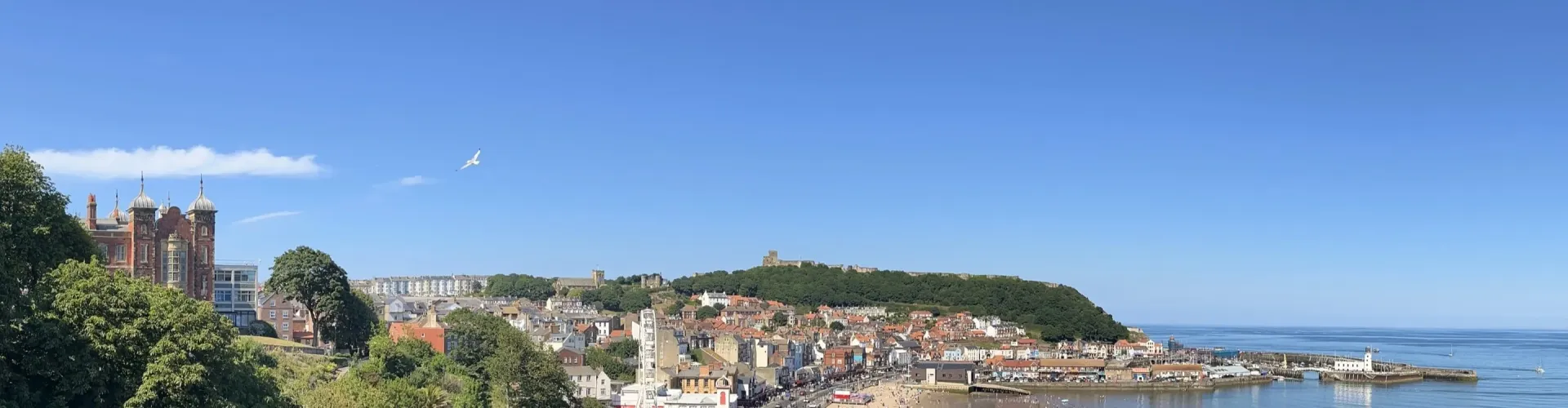 view over scarborough south bay with arcades on the seafront