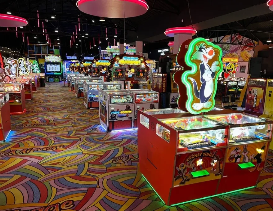 row of looney tunes coin pushers