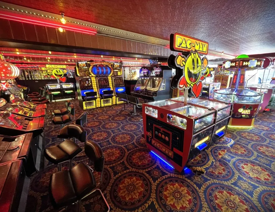 pac man 2p machines in the penny arcade