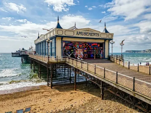 a British pier with an arcade at the entrance